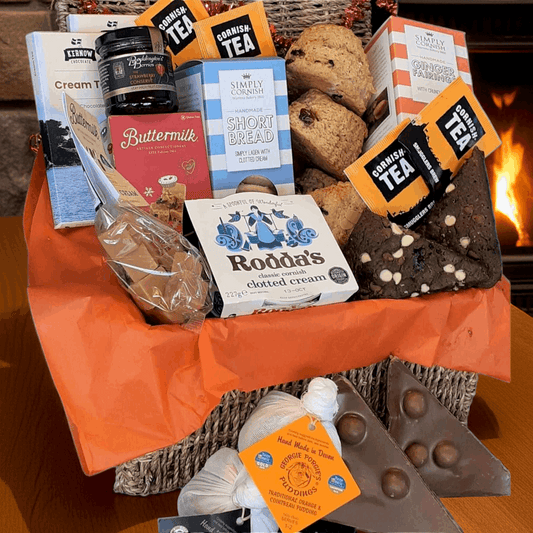 Christmas Joy Hamper - full of scones with jam and cream, fudge, biscuits, chocolate, christmas pudding, brownies and tiffin. Christmas gift hamper