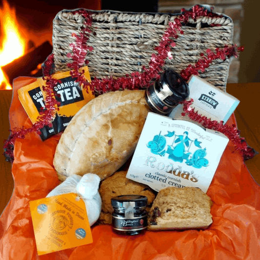 Christmas proper job hamper for one, with our delicious Christmas cream tea, Christmas pasty, cream tea chocolate bar and a Christmas pud.