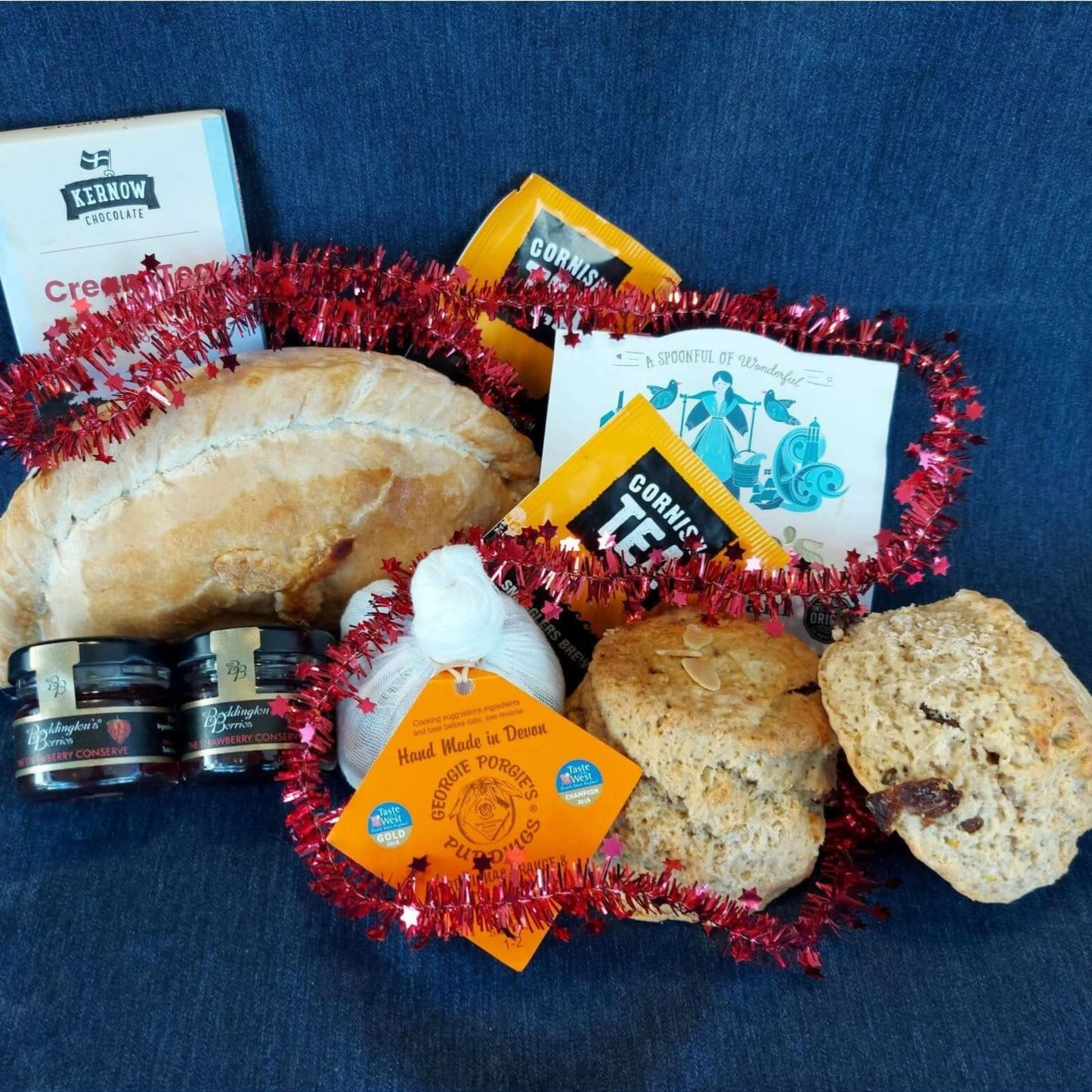 Christmas proper job for one, with our delicious Christmas cream tea, Christmas pasty, cream tea chocolate bar and a Christmas pud.