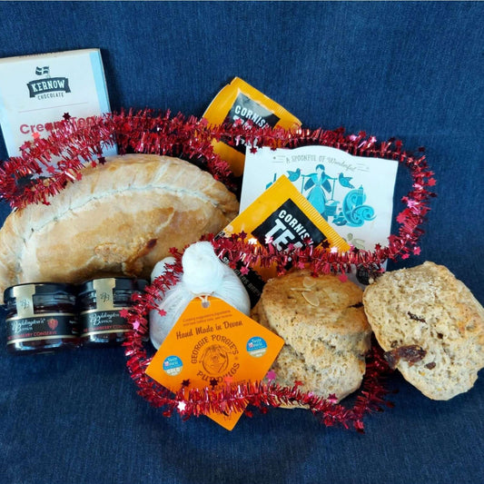 Christmas proper job for one, with our delicious Christmas cream tea, Christmas pasty, cream tea chocolate bar and a Christmas pud.