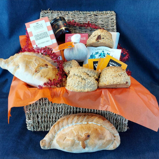 Christmas proper job hamper for two, with our delicious Christmas cream tea, Christmas pasty's cream tea chocolate bar, box of fairings, box of fudge and a Christmas pud.